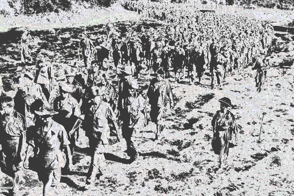 A solarized black and white image of a large column of French soldiers being led to a prison camp in the Vietnamese city of Điện Biên Phủ in 1954. France's loss in that battle was decisive in its loss of "Indochina" in general.